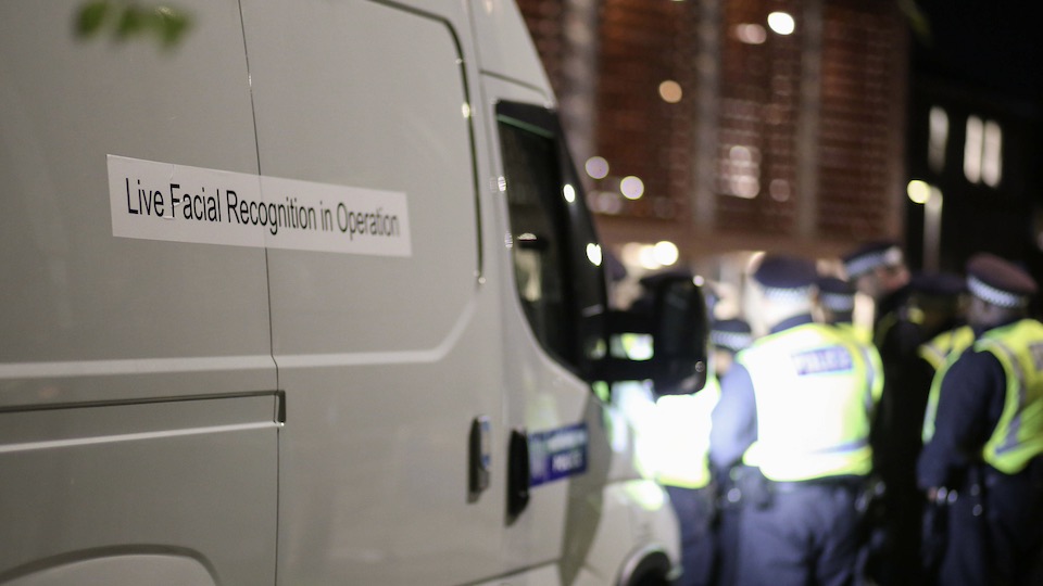 Mobile facial recognition unit in London, with officers