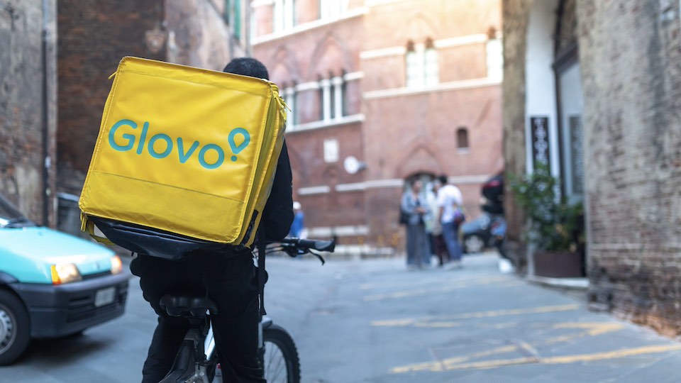 Cyclist with Glovo backpack